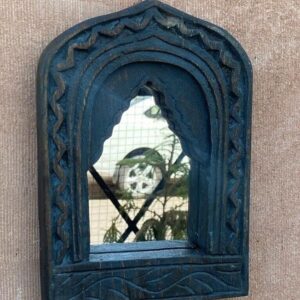 Antique carved wood mirror