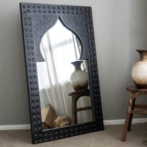 large carved wood mirror